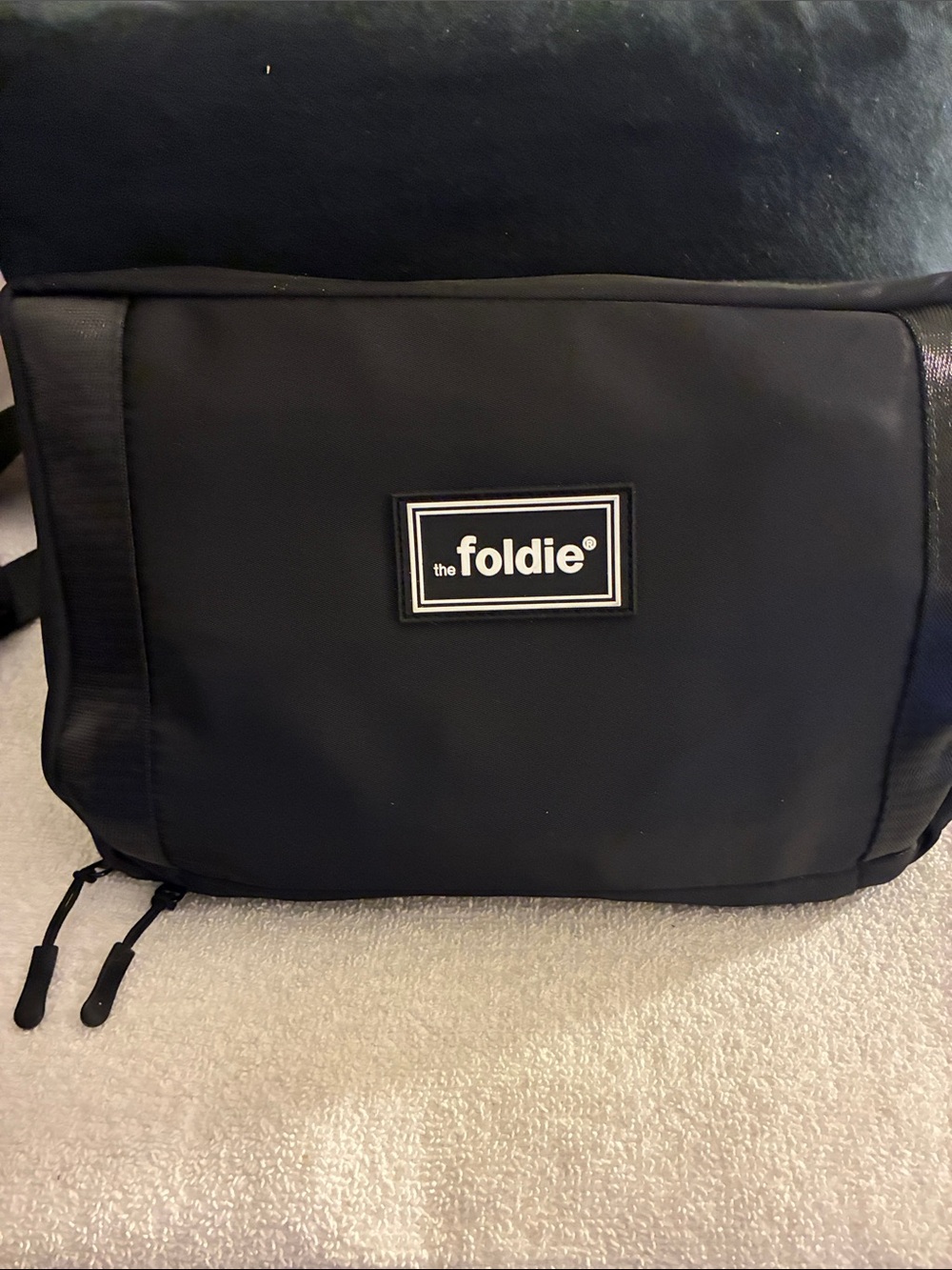 NWOT The Foldie Black Men's Messenger Bag w/travel inside. Unisex
